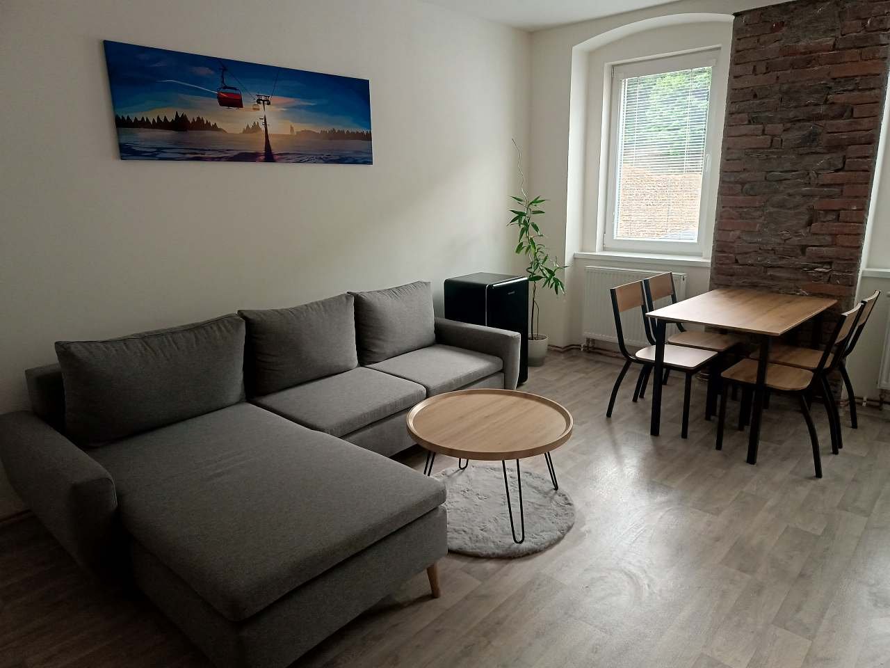 Obývací pokoj s rozkládacím gaučem