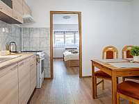 Kuchyň - apartmán k pronájmu Šatov