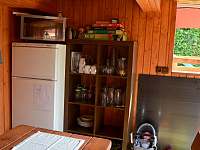 Společné prostory - lednička, mikrovlnka, hry, nádobí - pronájem apartmánu