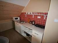 kuchyňka součástí každého pokoje - ubytování Lukov