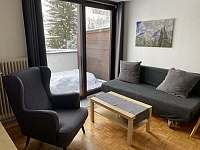 rozkládací gauč v obývacím pokoji - apartmán k pronajmutí Hintermoos