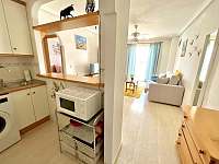Obývací pokoj a kuchyň - apartmán ubytování La Mata, Španělsko